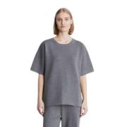 Moderne Strikbluse med Box Fit