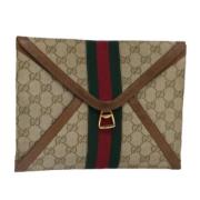 Pre-owned Canvas clutches