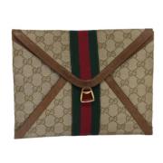 Pre-owned Canvas clutches