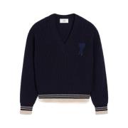 Ribstrikket sweater med broderede patches