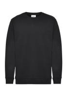 Sweat O-Neck Tops Sweatshirts & Hoodies Sweatshirts Black Boozt Mercha...