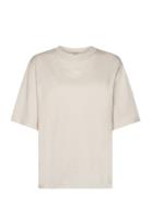 C_Enis_Small_Logo Tops T-shirts & Tops Short-sleeved Cream BOSS