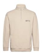 Lass Tech Half-Zip Designers Sweatshirts & Hoodies Sweatshirts Cream W...