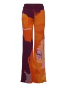 Rodebjer Lejon Art Bottoms Trousers Flared Orange RODEBJER