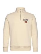 Graphic Half Zip Tops Sweatshirts & Hoodies Sweatshirts Cream GANT