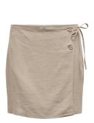 Onlcaro Mw Wrap Linen Bl Skirt Cc Pnt Skirts Short Skirts Beige ONLY